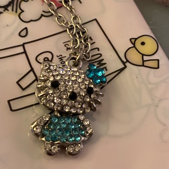 Hello Kitty Inspired necklace.  Rhinestones and lower body movement.  Unique! - Picture 2 of 4